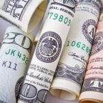 Passive Income - Rolled 20 U.s Dollar Bill