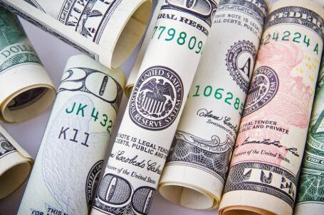 Passive Income - Rolled 20 U.s Dollar Bill