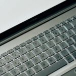 Marketing Impact - Black and Silver Laptop Computer